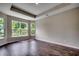 Well-lit bedroom with bay windows and hardwood floors at Tbd1 Kapalua Loop, Little River, SC 29566