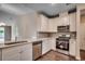 Modern kitchen features stainless steel appliances and light gray cabinetry at Tbd1 Kapalua Loop, Little River, SC 29566