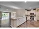 Modern kitchen with white cabinets and quartz countertops at Tbd1 Kapalua Loop, Little River, SC 29566