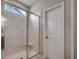 Bathroom boasts a large shower with marble tile and a modern glass enclosure at Tbd1 Kapalua Loop, Little River, SC 29566