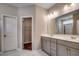 Primary bathroom with dual vanities and a spacious walk-in closet at Tbd1 Kapalua Loop, Little River, SC 29566
