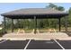 Covered picnic area with multiple tables for outdoor dining at Tbd2 Kapalua Loop, Little River, SC 29566