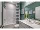 Clean bathroom with a shower/tub combo and green walls at Tbd2 Kapalua Loop, Little River, SC 29566