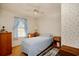 Bright bedroom with a single bed and floral wallpaper at 894 S Marlin Circle, Murrells Inlet, SC 29576