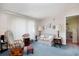 Cozy living room featuring rocking chairs, a sofa, and ample natural light at 894 S Marlin Circle, Murrells Inlet, SC 29576