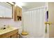 Clean bathroom with a shower/tub combo and vanity at 894 S Marlin Circle, Murrells Inlet, SC 29576