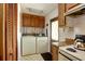 Practical laundry room with washer, dryer, and extra storage at 894 S Marlin Circle, Murrells Inlet, SC 29576