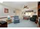 Relaxing living room with comfortable seating and a ceiling fan at 894 S Marlin Circle, Murrells Inlet, SC 29576