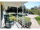 Relaxing front porch with rocking chair and view of neighborhood at 894 S Marlin Circle, Murrells Inlet, SC 29576