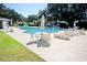 Inviting community pool with lounge chairs and tables at 894 S Marlin Circle, Murrells Inlet, SC 29576