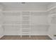 Large walk-in closet with ample shelving and hanging space at 1228 Colusa Ct., Little River, SC 29566