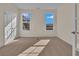 Spacious bedroom with neutral carpeting and large windows at 1228 Colusa Ct., Little River, SC 29566