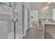 Bathroom with walk-in shower, double vanity, and hexagon tile floor at 1228 Colusa Ct., Little River, SC 29566