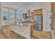Modern kitchen with stainless steel appliances and island at 1228 Colusa Ct., Little River, SC 29566