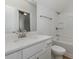 Modern bathroom with white vanity, bathtub, and shower at 43 Melbourne Ct., Murrells Inlet, SC 29576