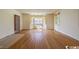 Spacious living room featuring hardwood floors and a bay window at 1002 Evans Rd., Marion, SC 29571