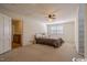 Spacious bedroom with built-in shelving and ceiling fan at 1002 Evans Rd., Marion, SC 29571