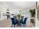 Open concept kitchen and dining area with white cabinets and modern appliances at 2815 Biscane Ct., Conway, SC 29527