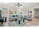 Living room features hardwood floors, comfy seating, and large windows at 2815 Biscane Ct., Conway, SC 29527