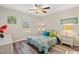 Bedroom with ceiling fan, large window, and decorative bedding at 2815 Biscane Ct., Conway, SC 29527