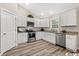 Modern kitchen with white cabinets and stainless steel appliances at 2815 Biscane Ct., Conway, SC 29527
