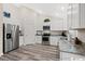 Modern kitchen with white cabinets and granite countertops at 2815 Biscane Ct., Conway, SC 29527