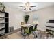 Bright home office features a desk, two chairs, and built-in shelving at 2815 Biscane Ct., Conway, SC 29527