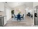 Bright dining area with hardwood floors and view into living room at 2815 Biscane Ct., Conway, SC 29527
