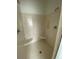 Large walk-in shower with built-in corner seat at 333 William St., Myrtle Beach, SC 29577