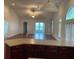 Open kitchen with a large island and views into the living room at 333 William St., Myrtle Beach, SC 29577