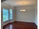 Formal dining room with hardwood floors and chandelier at 333 William St., Myrtle Beach, SC 29577