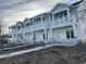 Two story townhouses with gray siding, stone accents and balconies at 780 Maxine Ct. # 8D, Myrtle Beach, SC 29577