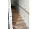 Unfinished wooden staircase with simple wood handrail at 780 Maxine Ct. # 8D, Myrtle Beach, SC 29577