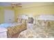 Bedroom with two double beds and a shared dresser at 1625 S Ocean Blvd. S # 909, North Myrtle Beach, SC 29582