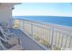 Balcony with ocean views and seating for two at 1625 S Ocean Blvd. S # 909, North Myrtle Beach, SC 29582