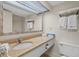 Bathroom with granite countertop and shower at 2207 S Ocean Blvd. # 1015, Myrtle Beach, SC 29577