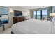 Ocean view bedroom with a king-size bed and balcony access at 2207 S Ocean Blvd. # 309, Myrtle Beach, SC 29577