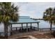 Quaint gazebo with rocking chairs overlooking the lake at Tbd Old Cypress Circle, Pawleys Island, SC 29585