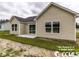 Rear view of house with patio and yard at 2819 Biscane Ct., Conway, SC 29527