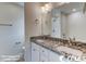 Bathroom with double vanity, granite countertop, and large mirror at 2819 Biscane Ct., Conway, SC 29527