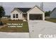 Beige one-story house with a two-car garage at 2819 Biscane Ct., Conway, SC 29527