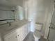 Bathroom with white vanity, quartz countertop, and a large tiled shower at 841 Maxine Ct. # 3A, Myrtle Beach, SC 29577