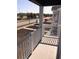 White railing balcony overlooking a street and green space at 861 Maxine Ct. # 4A, Myrtle Beach, SC 29577