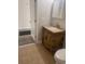 Simple bathroom with granite countertop and wooden vanity at 219 Oak Leaf Dr., Longs, SC 29568