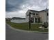 Two-story house with landscaped yard and white fence at 219 Oak Leaf Dr., Longs, SC 29568