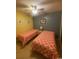 Guest bedroom with two twin beds and ceiling fan at 1880 Colony Dr. # 12-F, Surfside Beach, SC 29575
