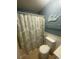 Clean bathroom with shower/tub combo and patterned curtain at 1880 Colony Dr. # 12-F, Surfside Beach, SC 29575