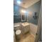 Small bathroom with single vanity, toilet, and nautical decor at 1880 Colony Dr. # 12-F, Surfside Beach, SC 29575