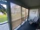 Screened porch with seating and shade at 1880 Colony Dr. # 12-F, Surfside Beach, SC 29575