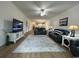 Spacious living room with hardwood floors and comfy seating at 4843 Luster Leaf Circle # 102, Myrtle Beach, SC 29577